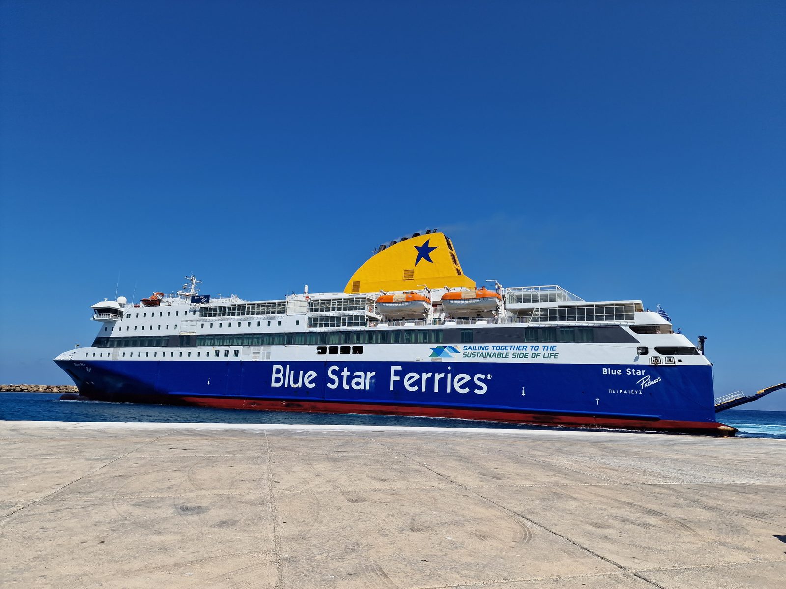 Blue Star Patmos, the car and passenger ferry operated by Blue Star Ferries, carrying up to 2,000 passengers and 430 cars.